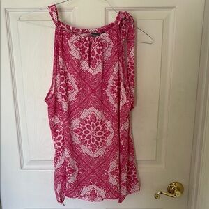 Pink and white patterned blouse